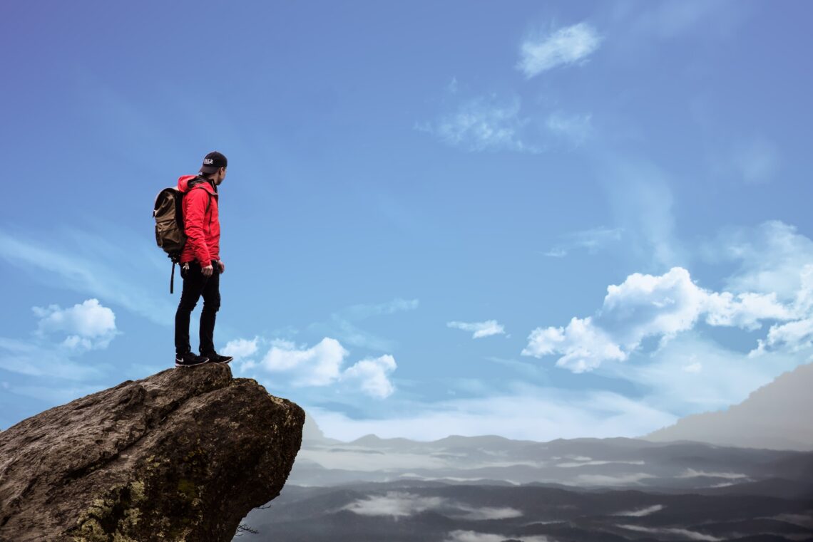 Man standing on a cliff edge