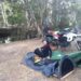 Camping by a river with swags with a motorbikes in the top end of australia