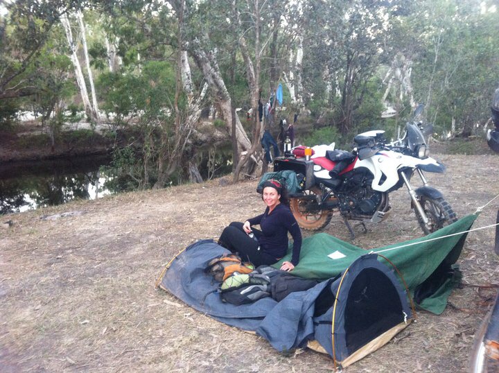 Camping by a river with swags with a motorbikes in the top end of australia