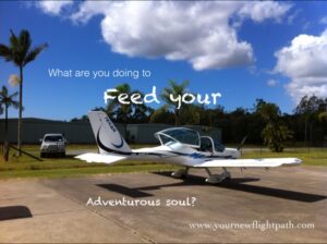 Aircraft on a tarmac with a quote - feed your adventurous soul