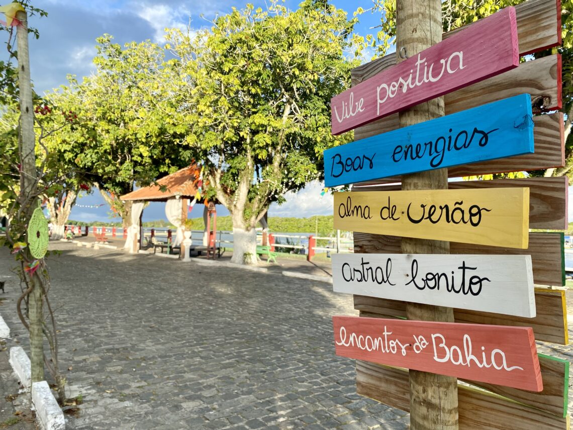 Wooden colourful sign post to different destinations