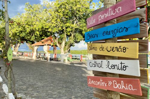 Wooden colourful sign post to different destinations