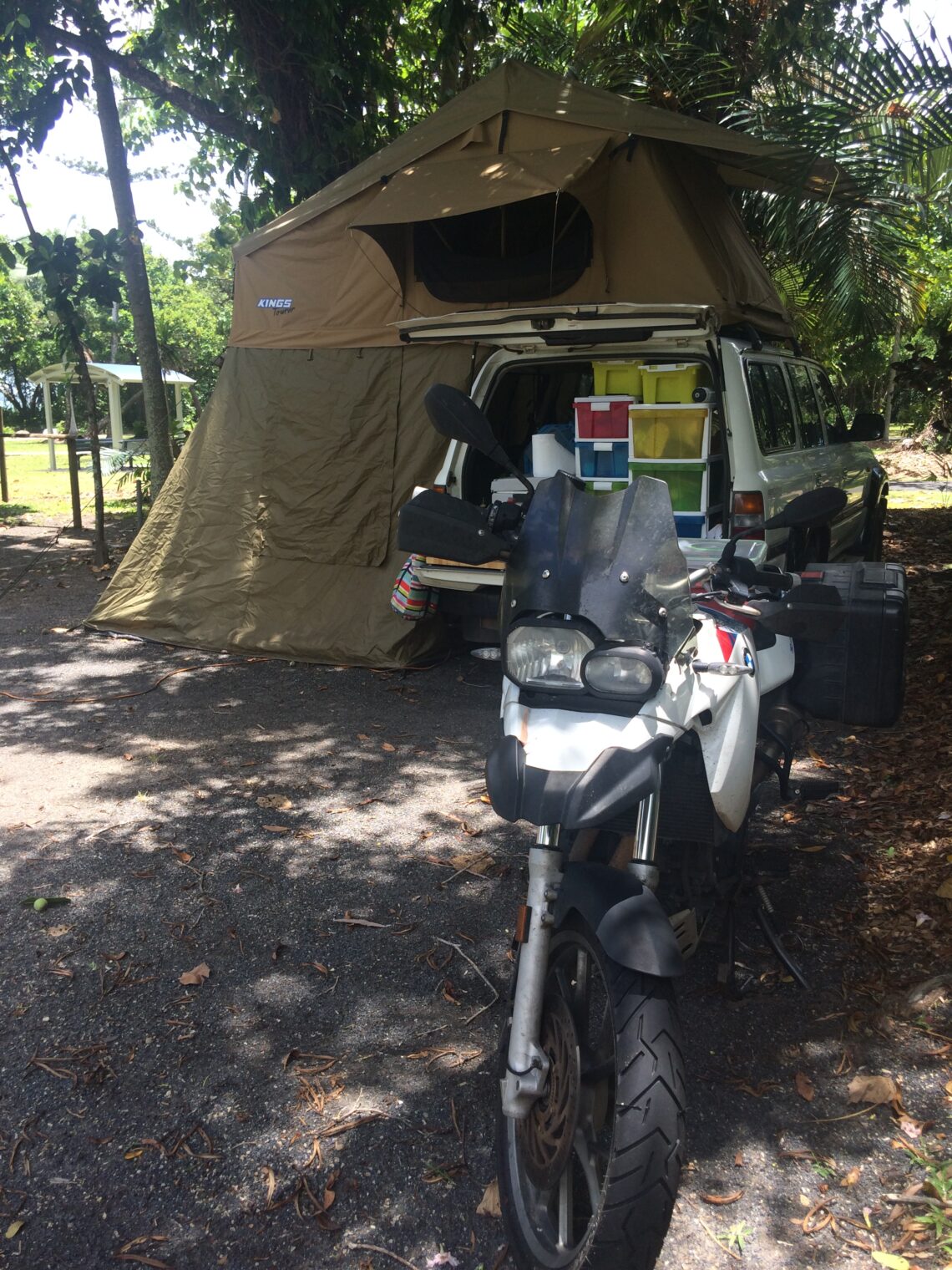 Camping with a motorbike in front