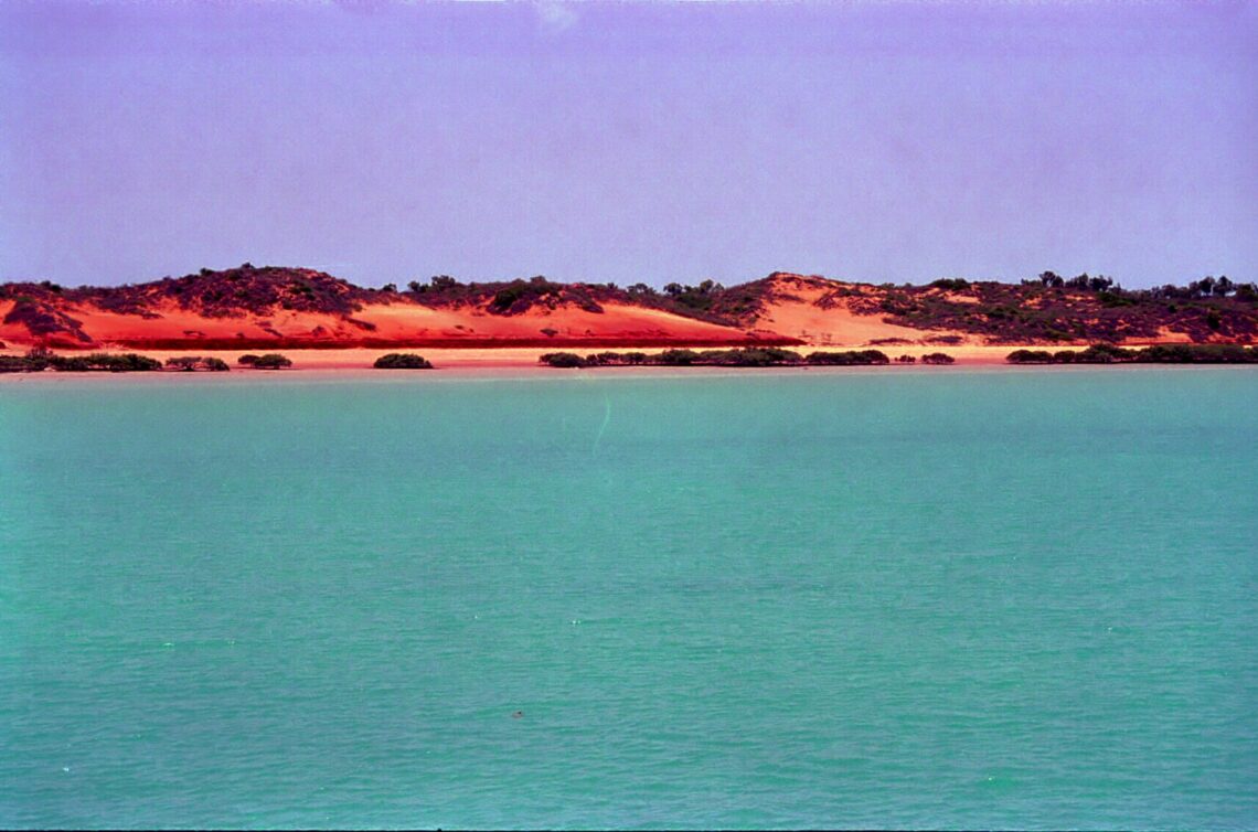 Ocean and Red Land with purple sky off Western Australia
