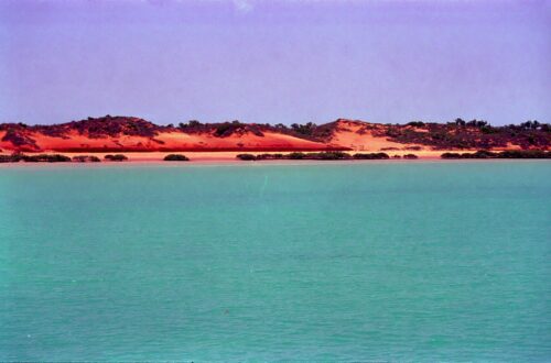 Ocean and Red Land with purple sky off Western Australia