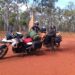Two motorbikes and two people in the outback of Australia